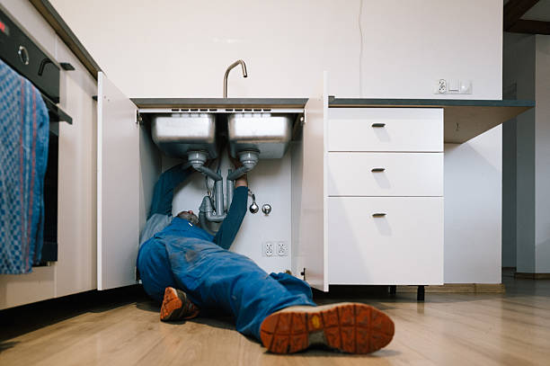 Professional Drain Cleaning technician working in Cherry Valley, IL